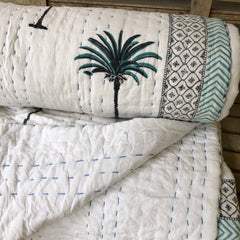 Kantha, Blue palms slightly padded cotton quilt.