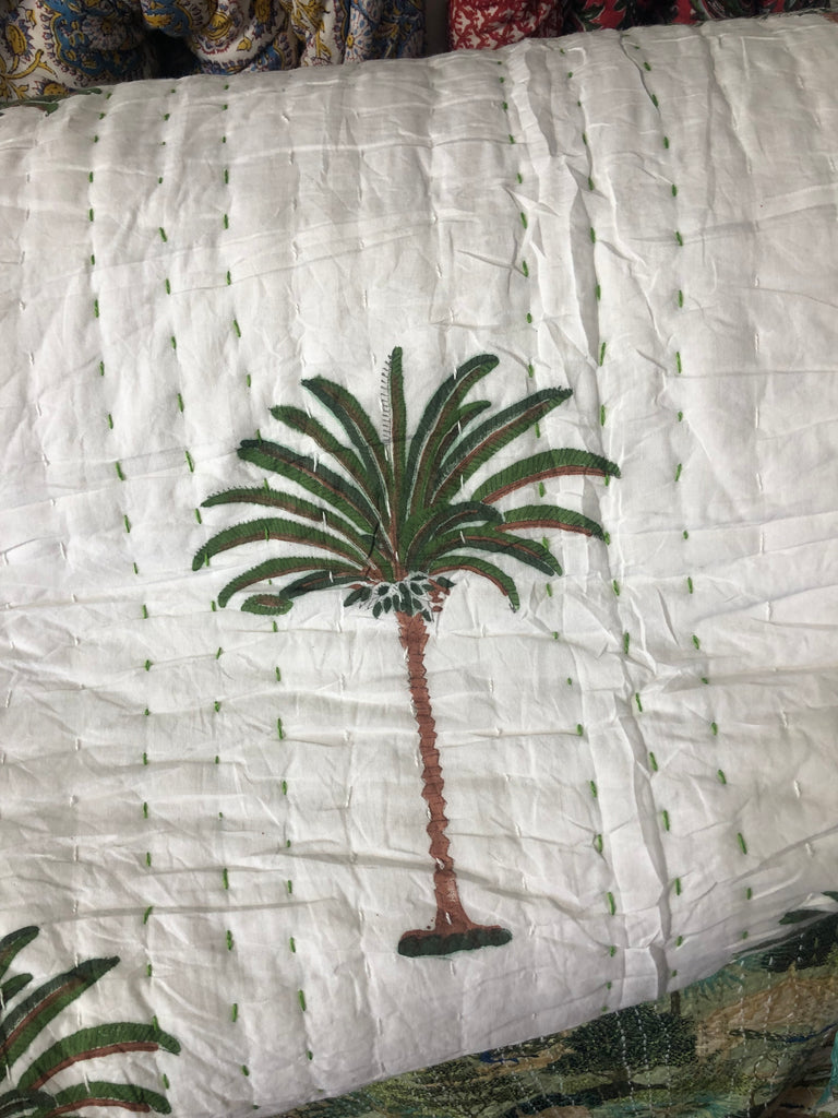Green Palms on white, slightly padded cotton quilt